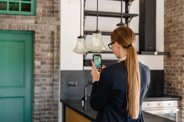 person taking photos of a property interior